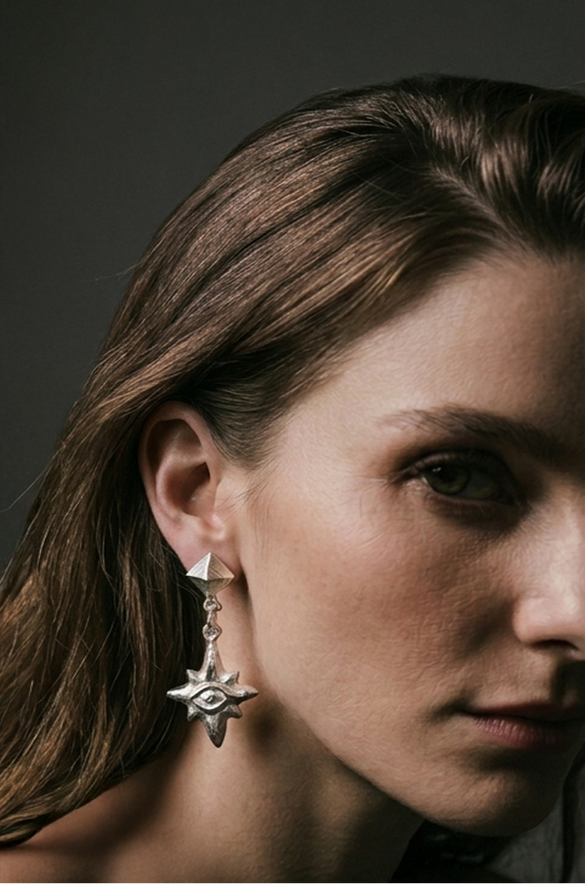 Aretes estrella tallada