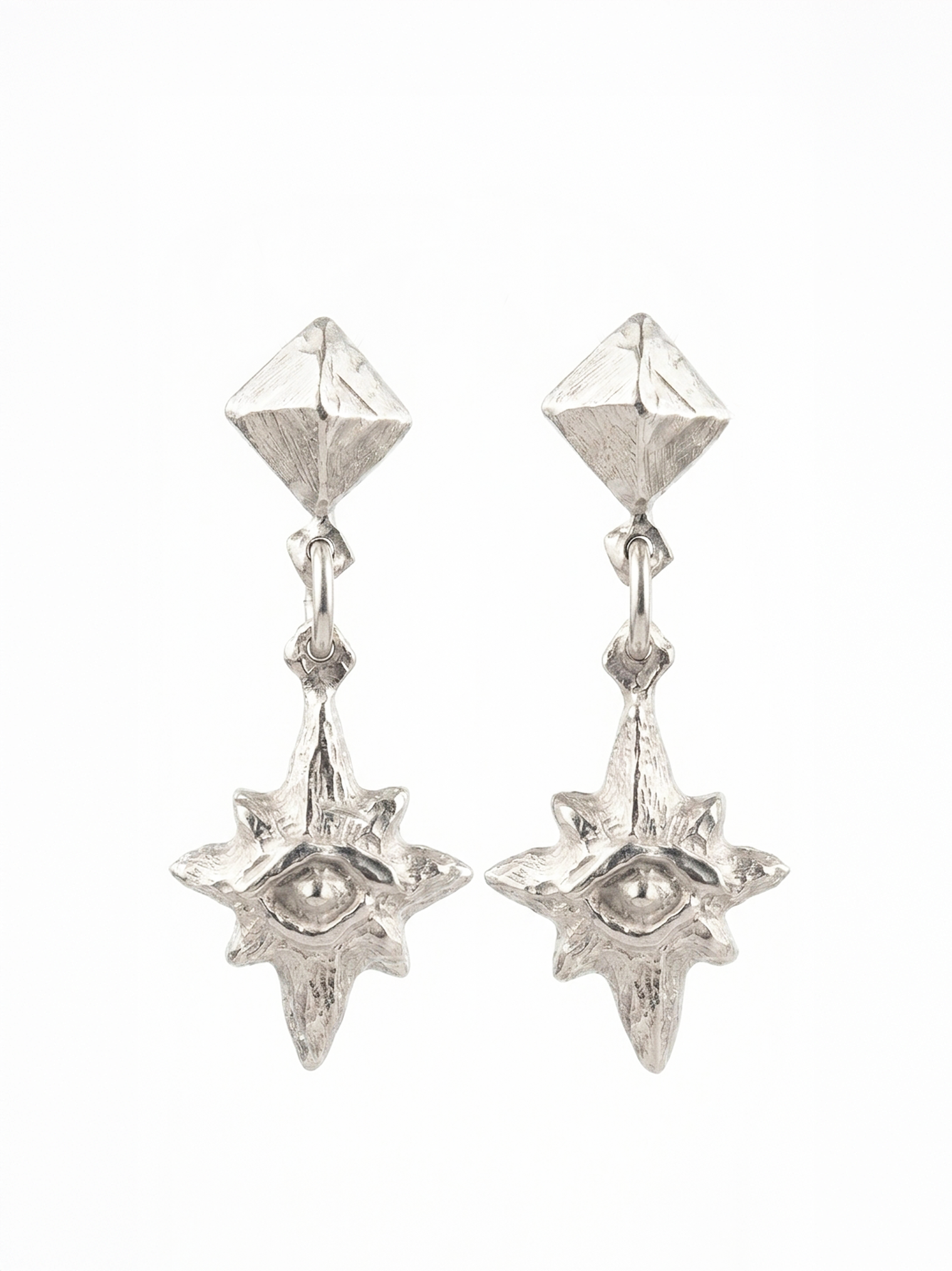 Aretes estrella tallada